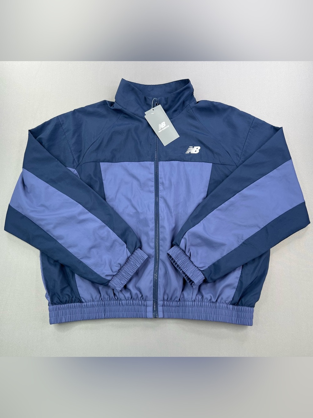 NEW BALANCE COLORBLOCK OVERSIZED FULL ZIP WATER RESISTANT WIND BREAKER JACKET